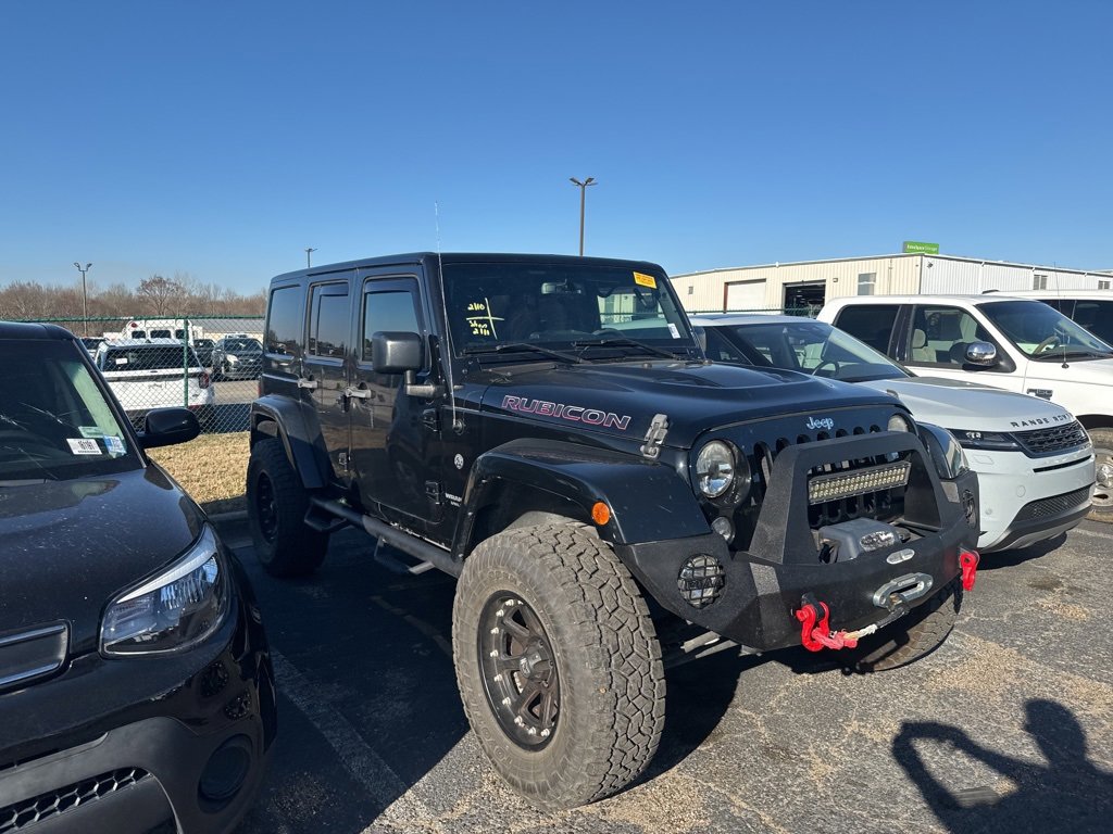 Used 2016 Jeep Wrangler Unlimited Rubicon w/ Dual Top Group image 1
