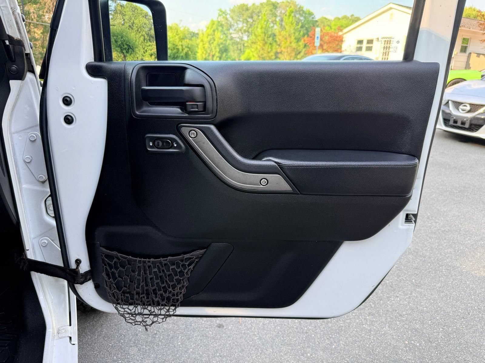 Used 2013 Jeep Wrangler Unlimited Sahara AWD/4WD image 22