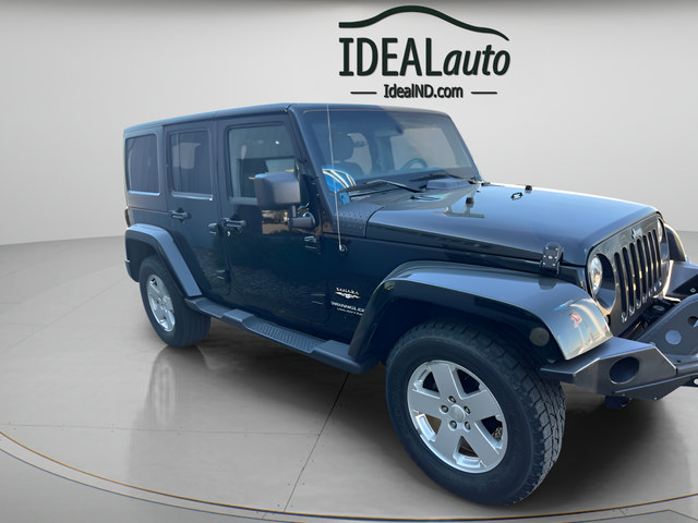 Used 2012 Jeep Wrangler Unlimited Sahara w/ Dual Top Group AWD/4WD image 1