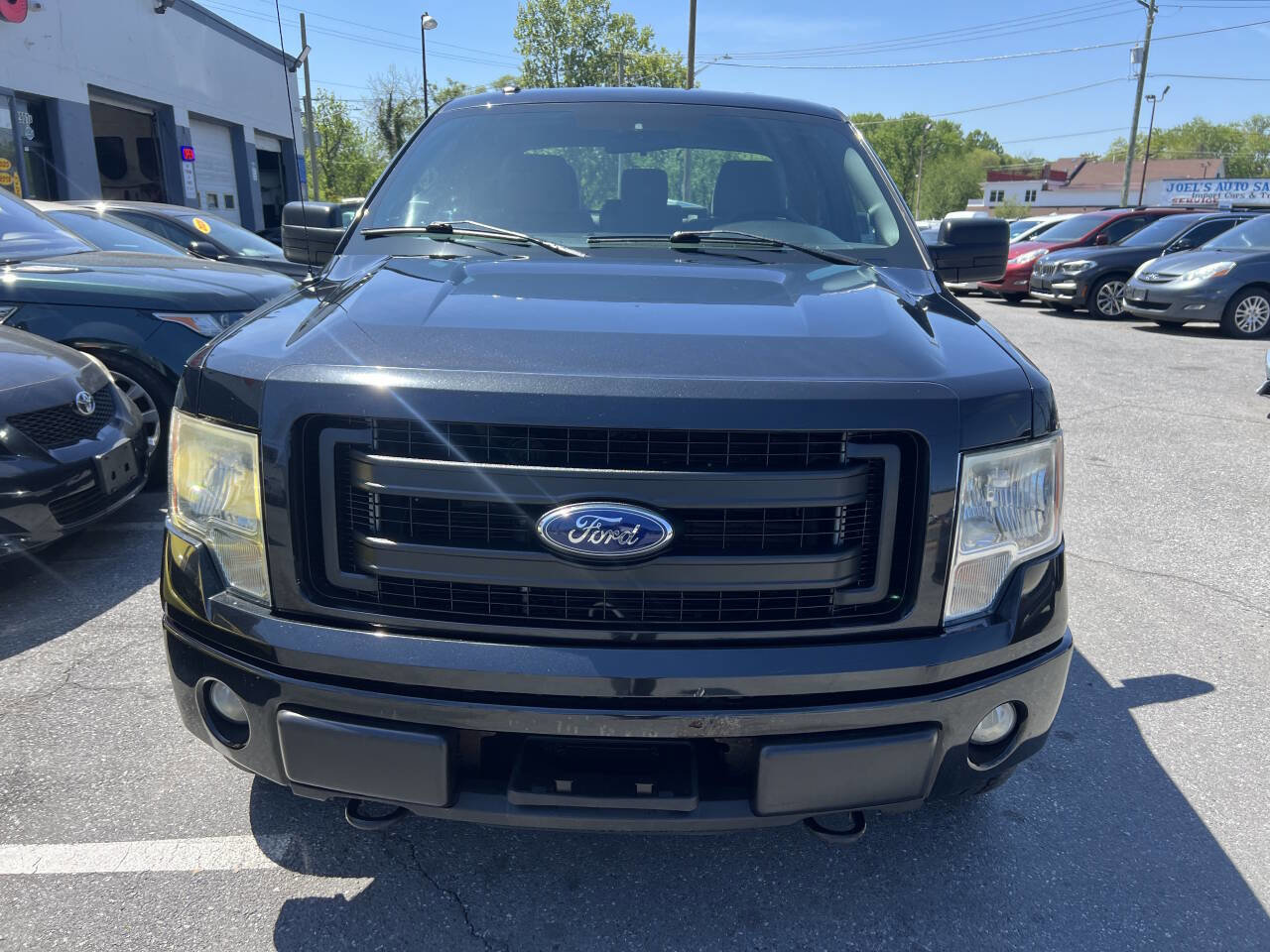 Used 2013 Ford F150 STX w/ Mid Equipment Group AWD/4WD image 2