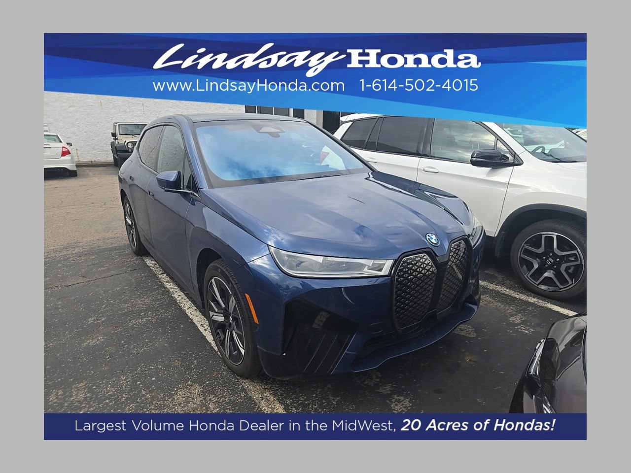 Used 2023 BMW iX xDrive50 w/ Sport Package AWD/4WD image 1