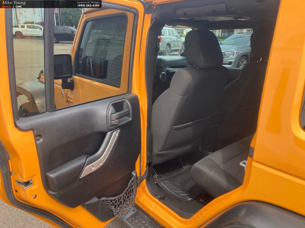 Used 2012 Jeep Wrangler Unlimited Sahara w/ Dual Top Group AWD/4WD image 11