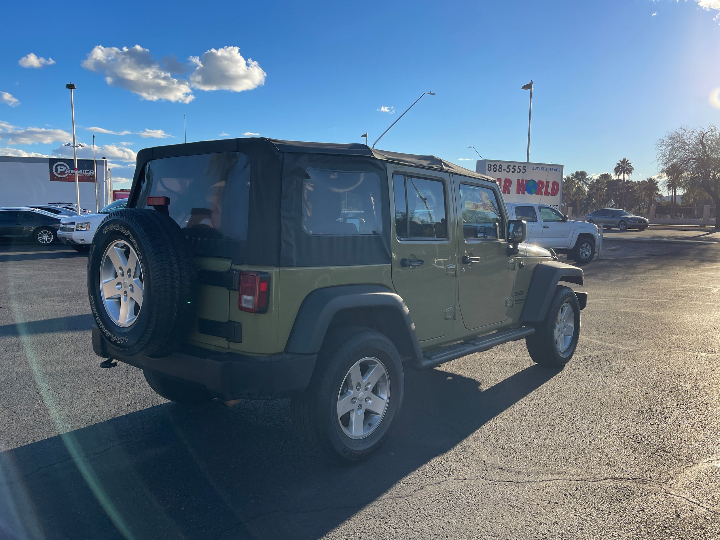 Used 2013 Jeep Wrangler Unlimited Sport w/ Mopar Black Appearance Group AWD/4WD image 5