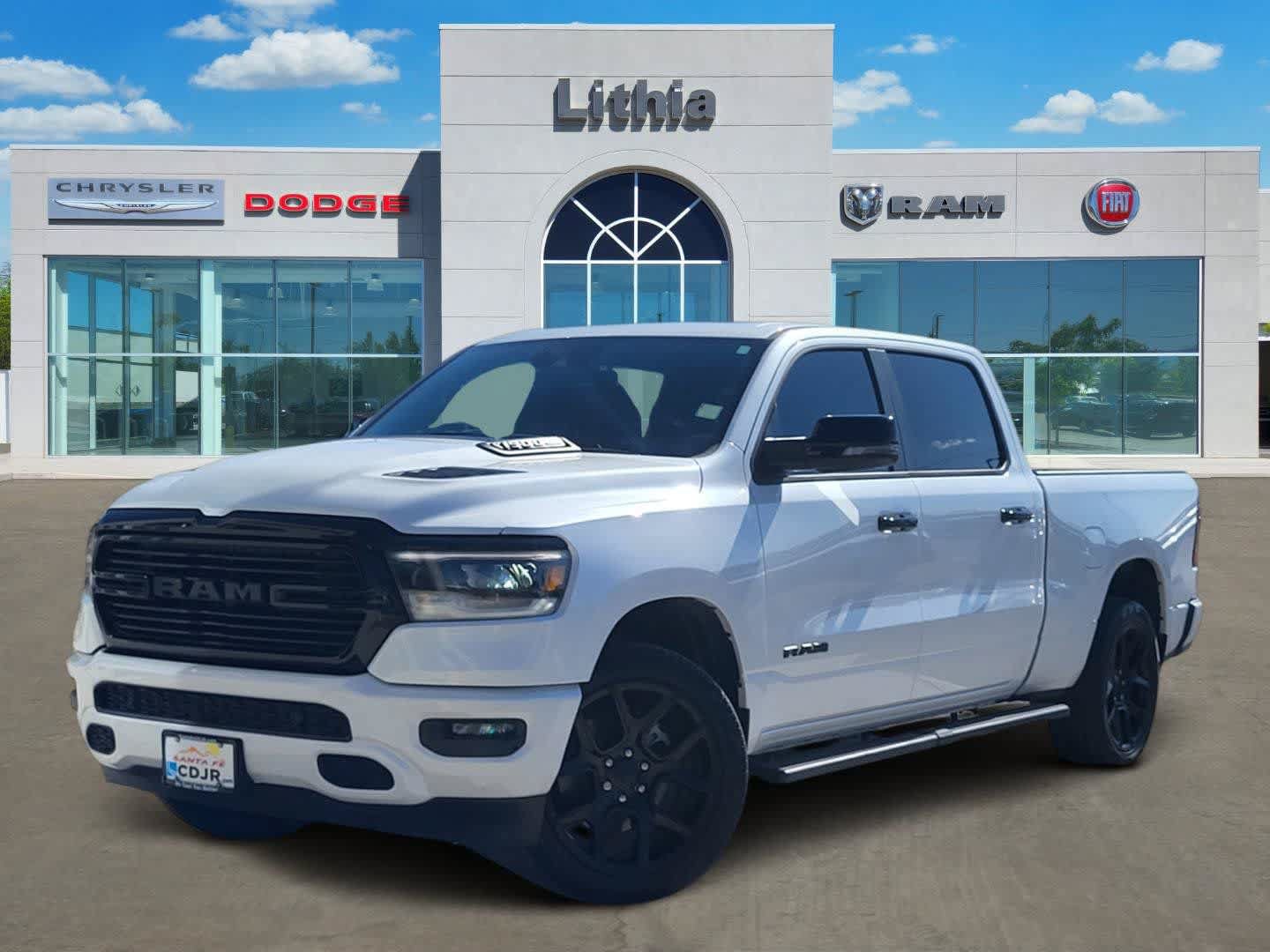 Used 2024 RAM 1500 Laramie AWD/4WD image 1