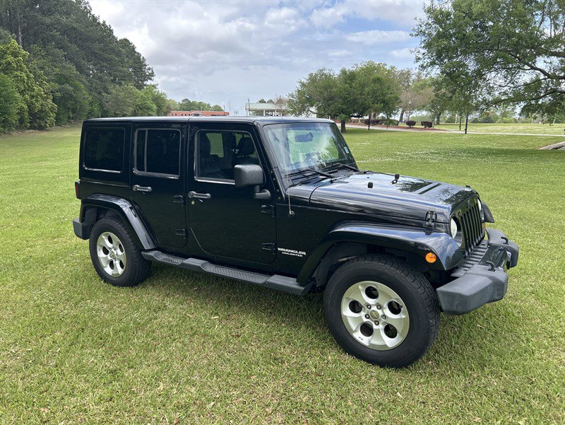 Used 2012 Jeep Wrangler Unlimited Sahara AWD/4WD image 1