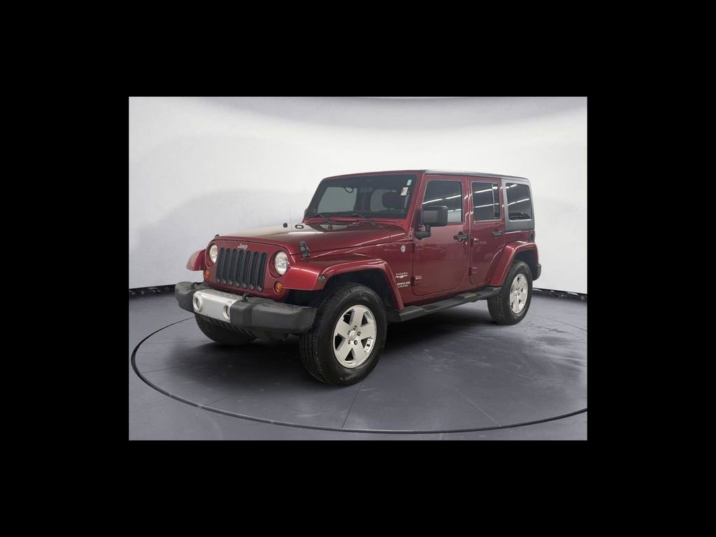 Used 2012 Jeep Wrangler Unlimited Sahara w/ Dual Top Group image 2