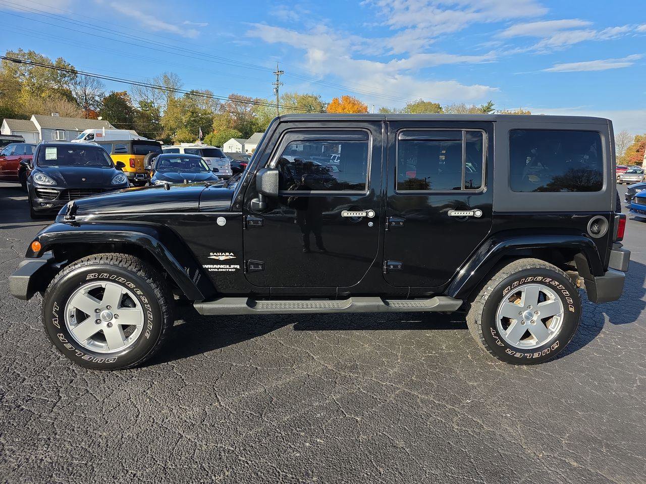 Used 2011 Jeep Wrangler Unlimited Sahara w/ Dual Top Group image 19