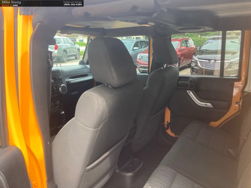 Used 2012 Jeep Wrangler Unlimited Sahara w/ Dual Top Group AWD/4WD image 13