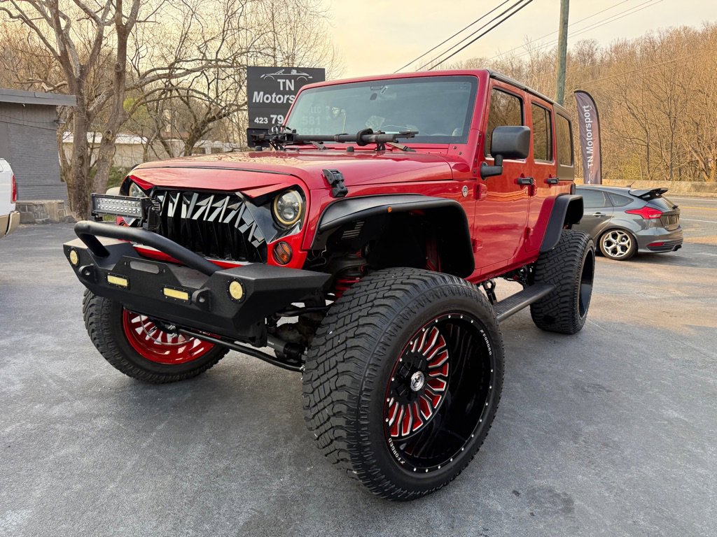 Used 2012 Jeep Wrangler Unlimited Sport AWD/4WD image 1