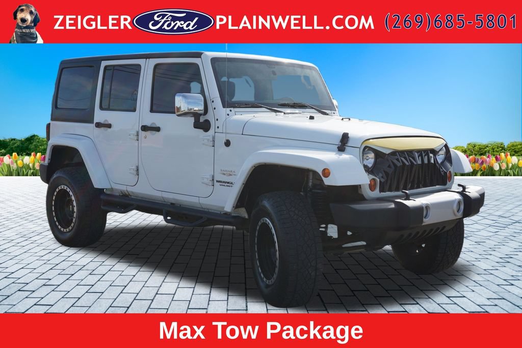 Used 2012 Jeep Wrangler Unlimited Sahara w/ Dual Top Group AWD/4WD image 7