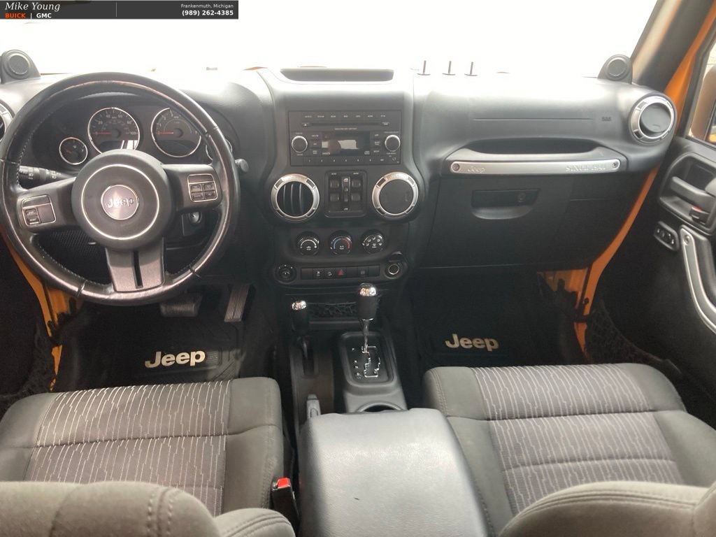 Used 2012 Jeep Wrangler Unlimited Sahara w/ Dual Top Group AWD/4WD image 16