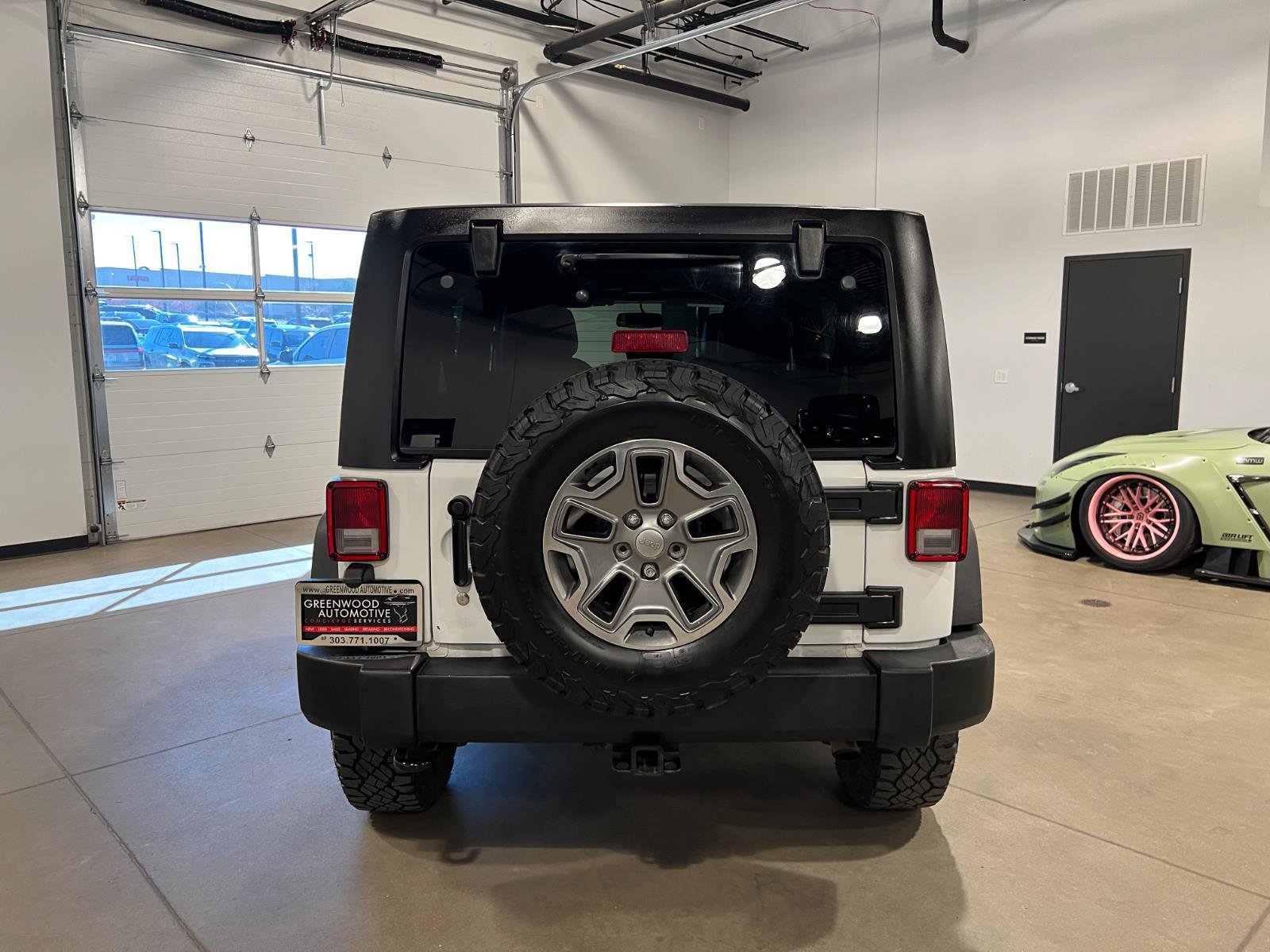 Used 2014 Jeep Wrangler Unlimited Rubicon w/ Dual Top Group image 4