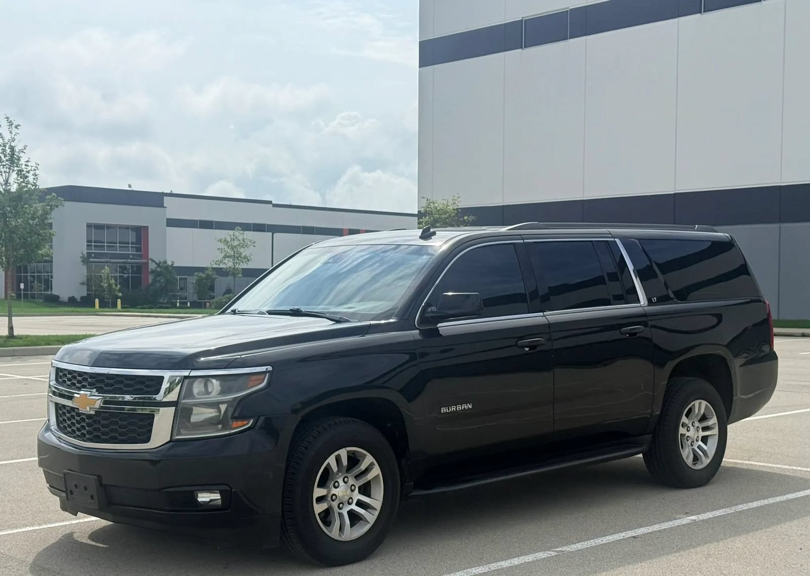 Used 2015 Chevrolet Suburban LT AWD/4WD image 1