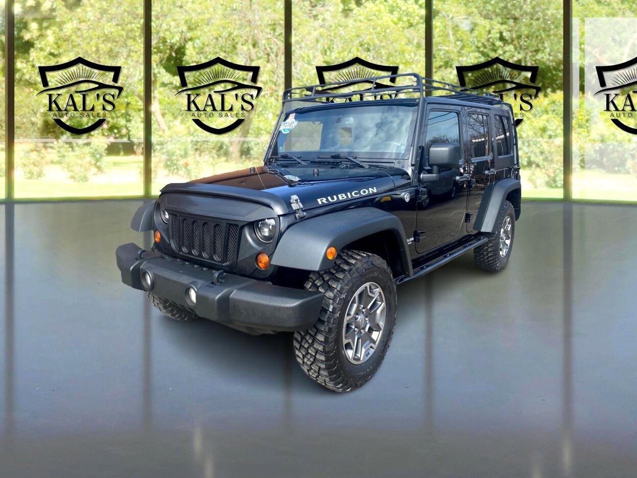 Used 2013 Jeep Wrangler Unlimited Rubicon w/ Dual Top Group