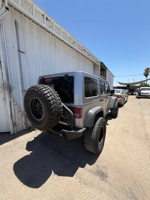 Used 2014 Jeep Wrangler Unlimited Rubicon w/ Connectivity Group AWD/4WD image 4