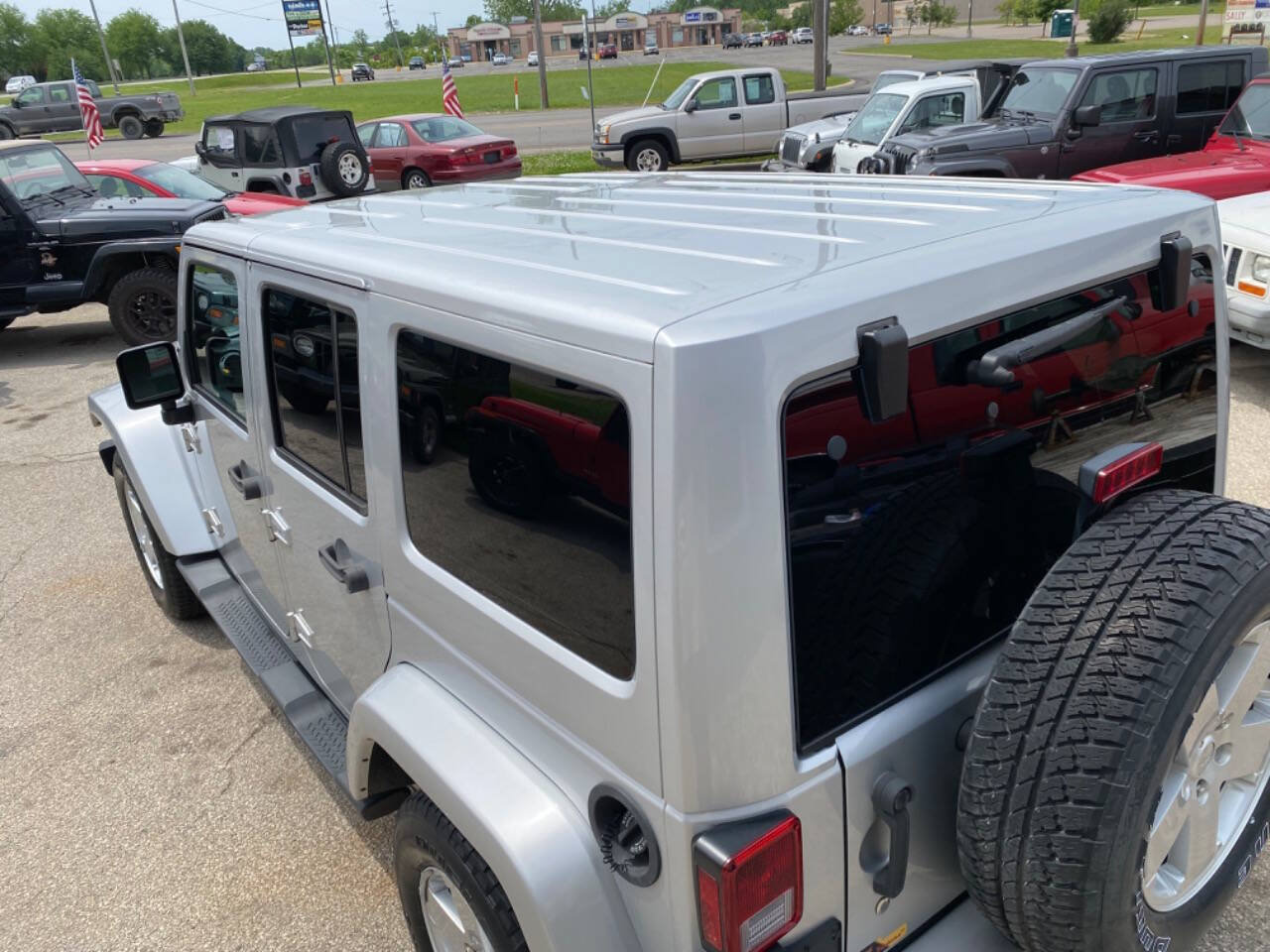 Used 2012 Jeep Wrangler Unlimited Sahara w/ Dual Top Group AWD/4WD image 45