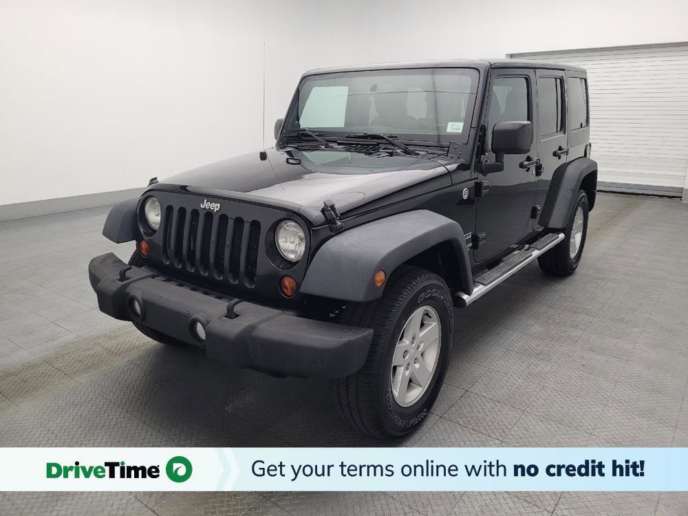 Used 2013 Jeep Wrangler Unlimited Sport image 1