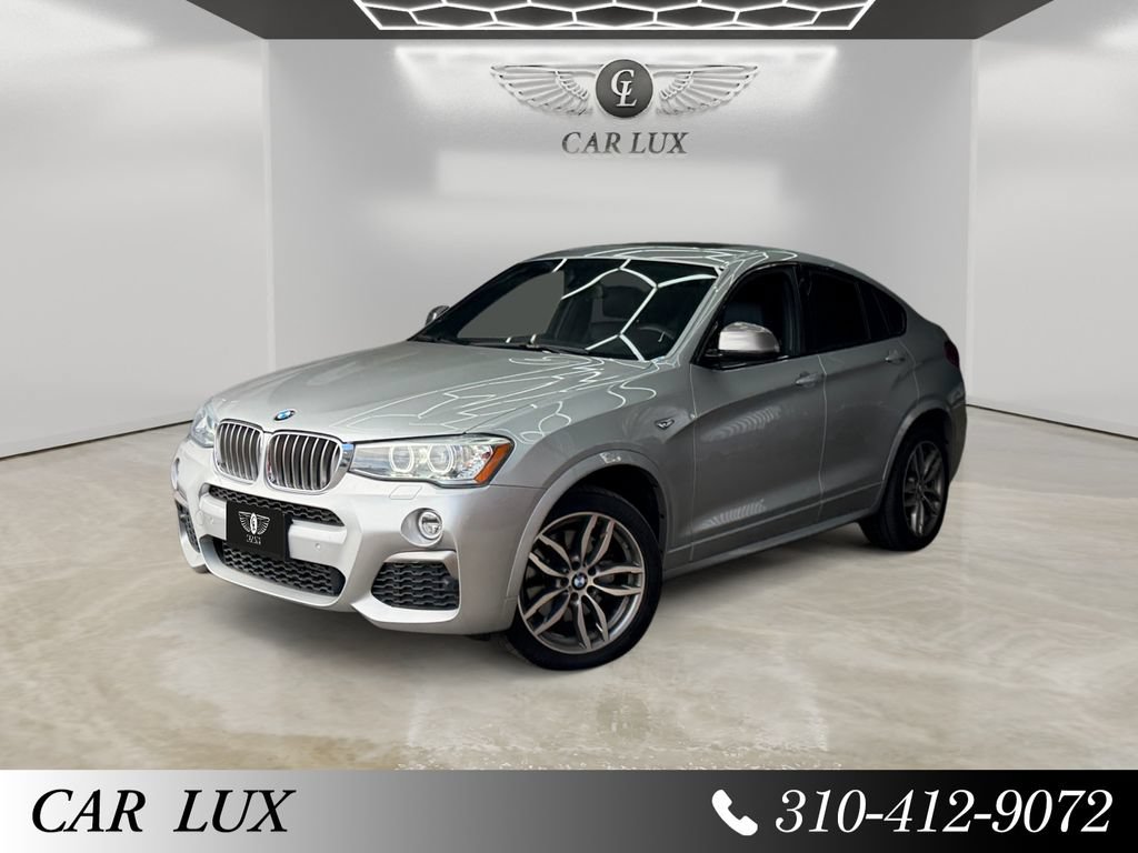 Used 2017 BMW X4 M40i w/ Technology Package AWD/4WD image 1