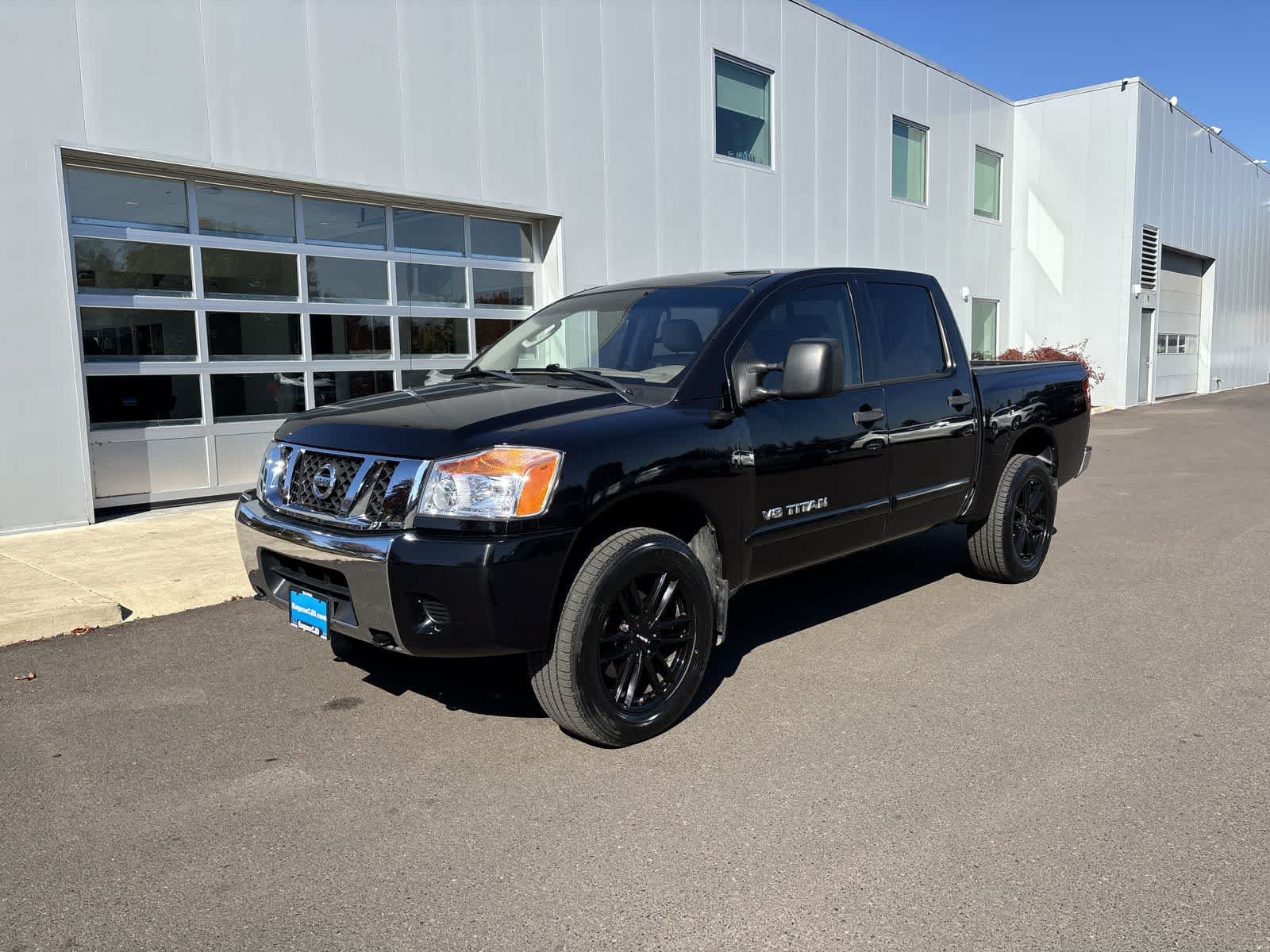 Used 2009 Nissan Titan SE AWD/4WD image 1