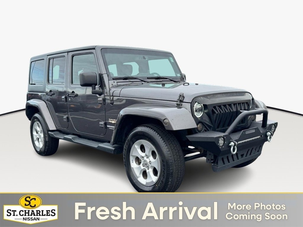 Used 2014 Jeep Wrangler Unlimited Sahara w/ Max Tow Package image 1