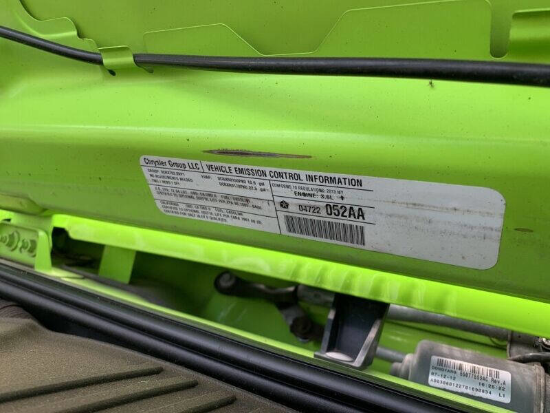 Used 2013 Jeep Wrangler Unlimited Sport w/ Mopar Black Appearance Group image 19