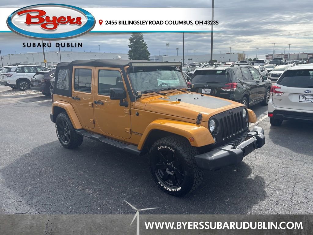 Used 2014 Jeep Wrangler Unlimited Sahara AWD/4WD image 1