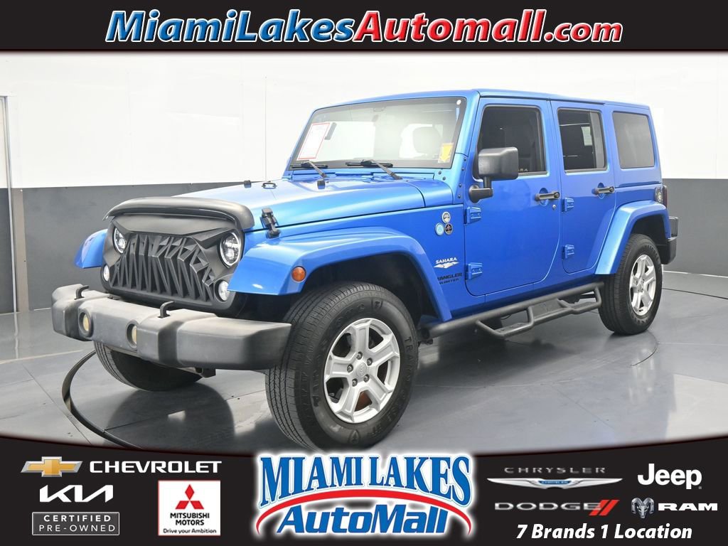 Used 2015 Jeep Wrangler Unlimited Sahara w/ Dual Top Group image 1
