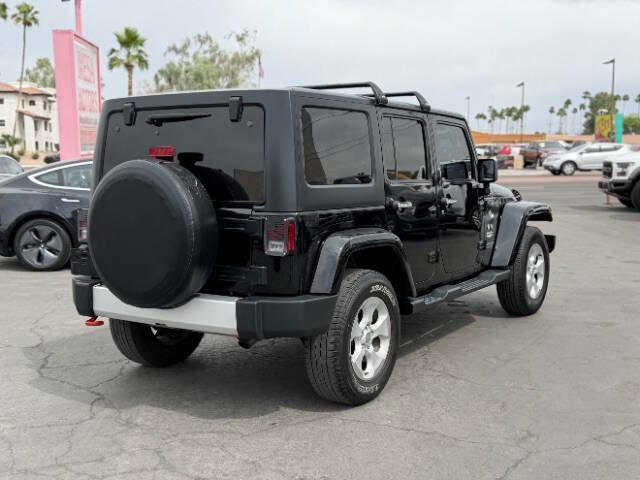 Used 2014 Jeep Wrangler Unlimited Sahara w/ Dual Top Group AWD/4WD image 3