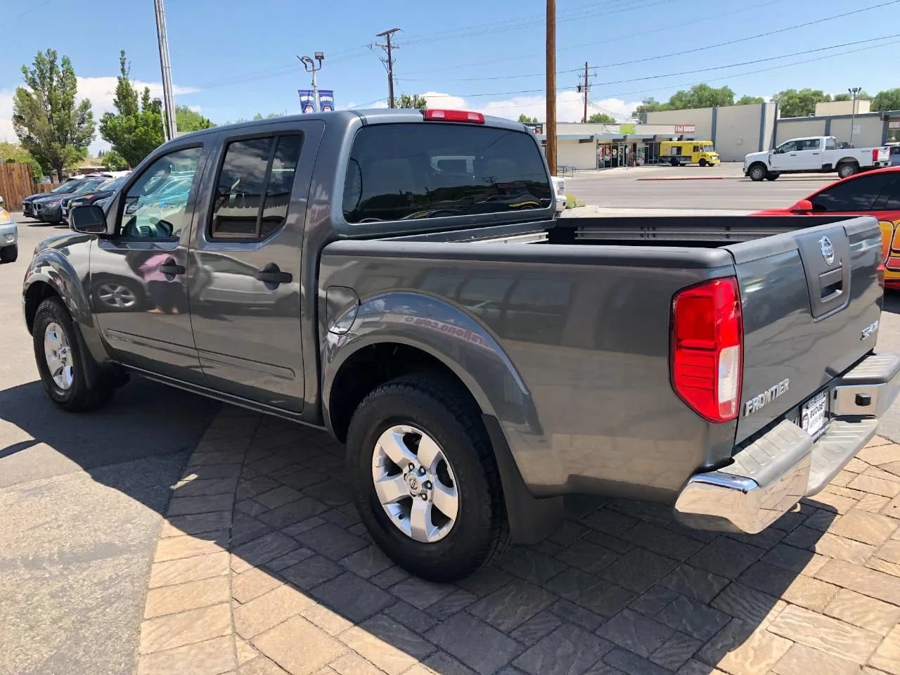 Used 2009 Nissan Frontier SE w/ SE Value Truck Pkg AWD/4WD image 4