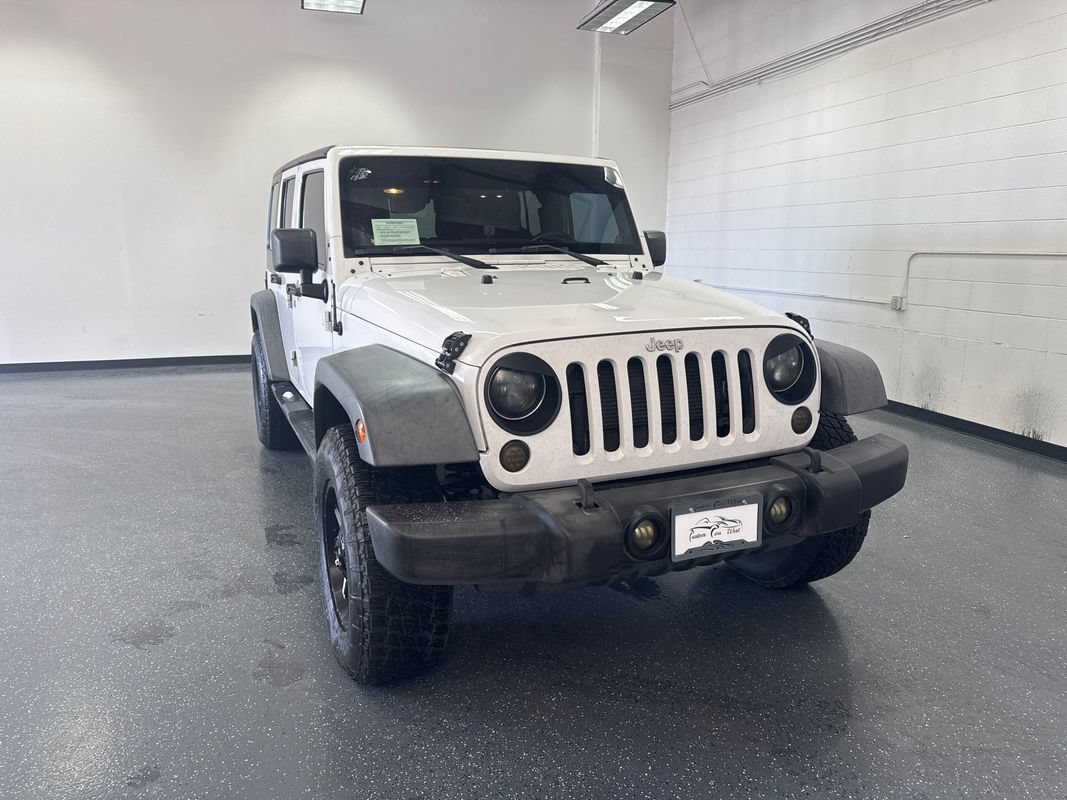 Used 2013 Jeep Wrangler Unlimited Sport AWD/4WD image 1