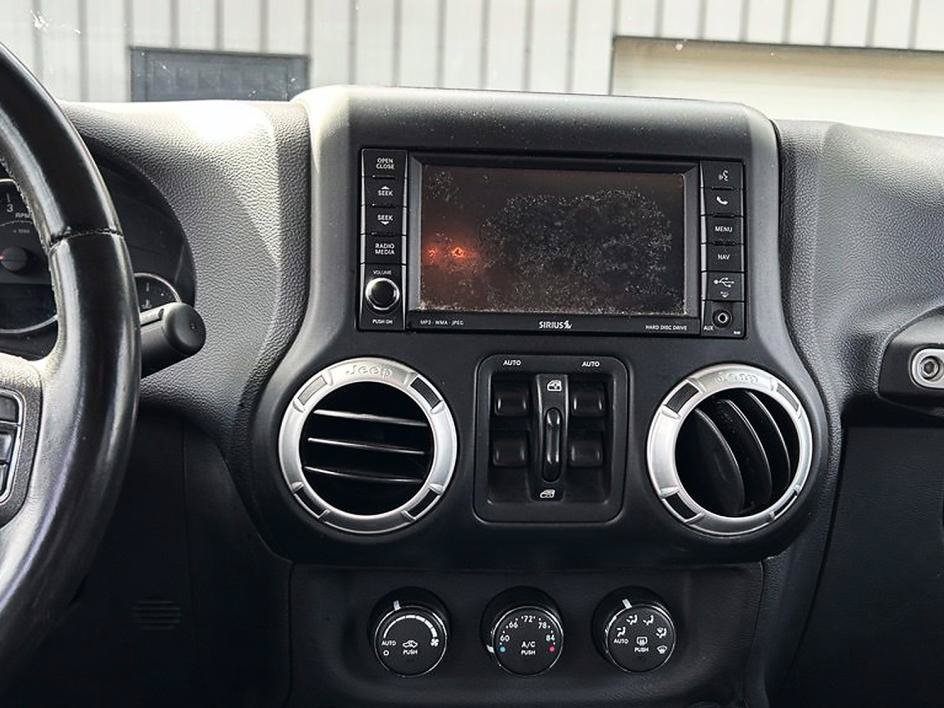 Used 2012 Jeep Wrangler Unlimited Sahara w/ Dual Top Group AWD/4WD image 9