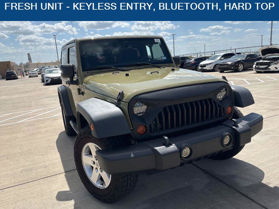 Used 2013 Jeep Wrangler Sport AWD/4WD image 1