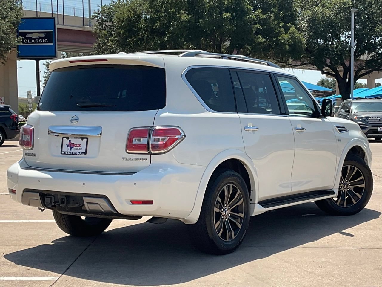 Used 2019 Nissan Armada Platinum w/ Captain's Chairs Package AWD/4WD image 4