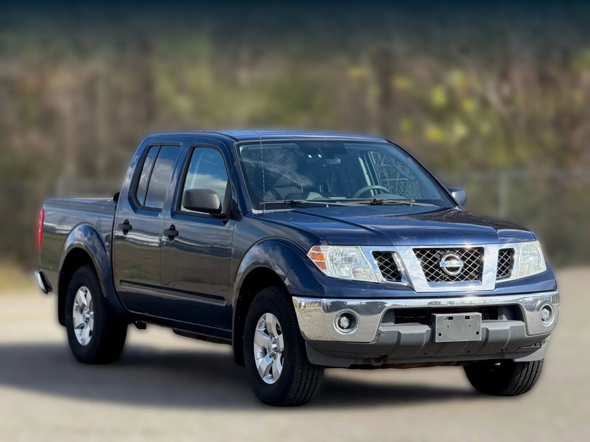 Used 2011 Nissan Frontier SV image 1