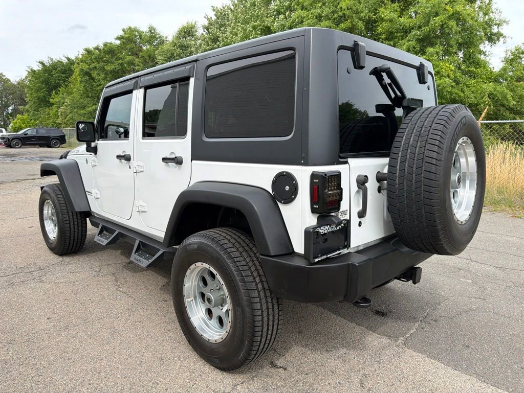 Used 2011 Jeep Wrangler Unlimited Rubicon w/ Dual Top Group AWD/4WD image 4