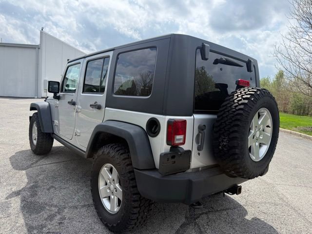 Used 2010 Jeep Wrangler Unlimited Rubicon w/ Dual Top Group AWD/4WD image 5