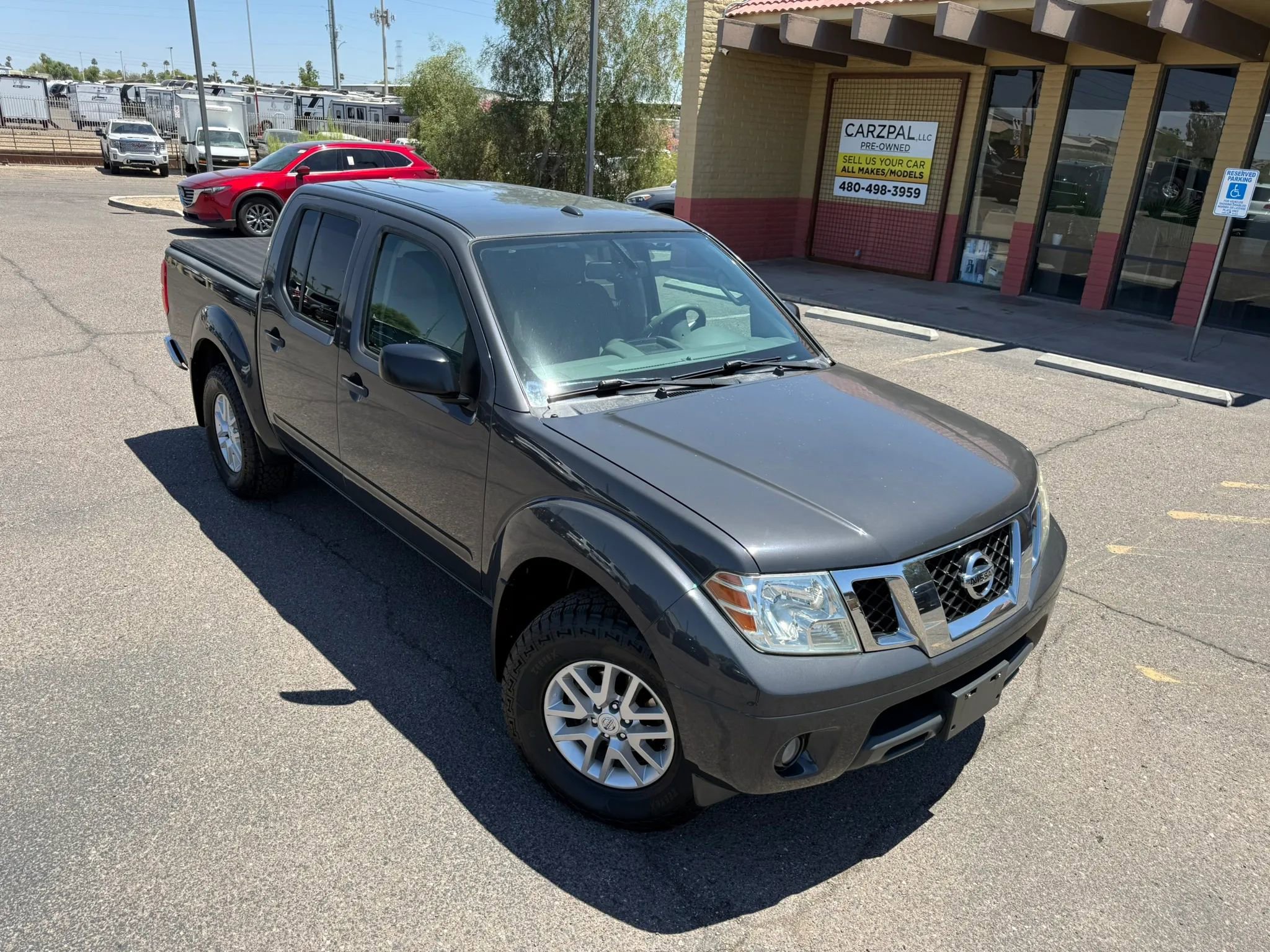 Used 2015 Nissan Frontier SV w/ SV Value Truck Package AWD/4WD image 2