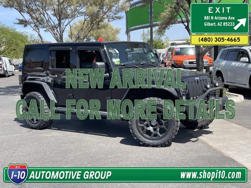 Used 2014 Jeep Wrangler Unlimited Rubicon w/ Dual Top Group AWD/4WD image 1