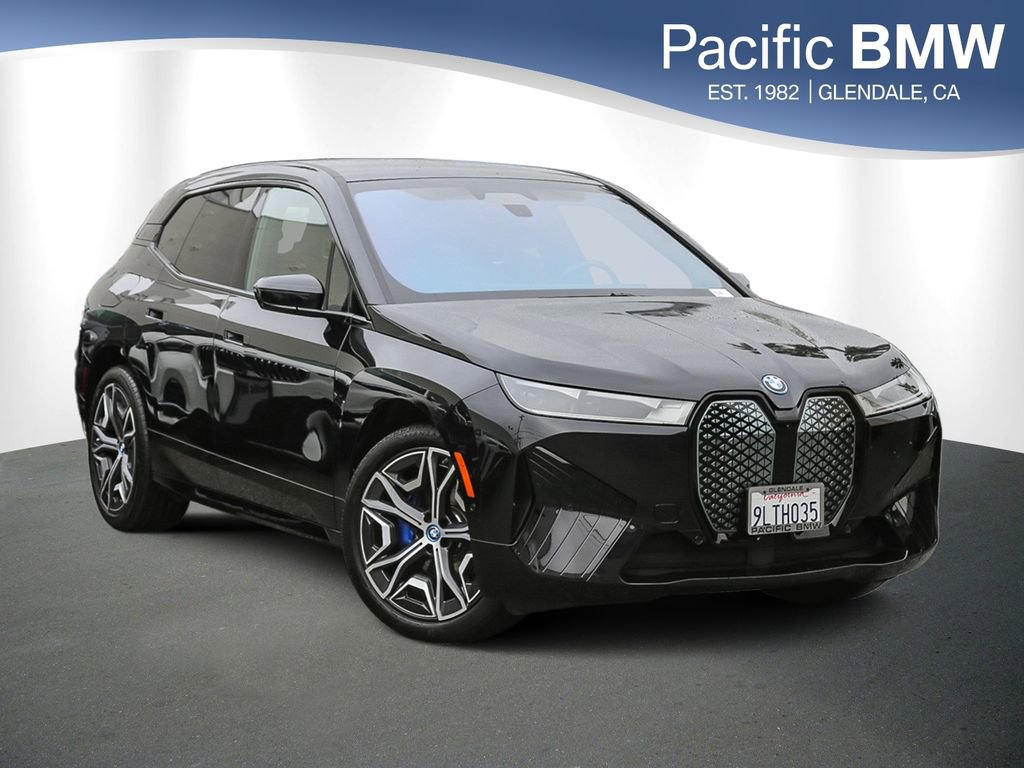 Used 2025 BMW iX xDrive50 w/ Premium Package AWD/4WD image 1