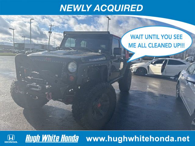 Used 2013 Jeep Wrangler Unlimited Rubicon w/ Max Tow Pkg image 1