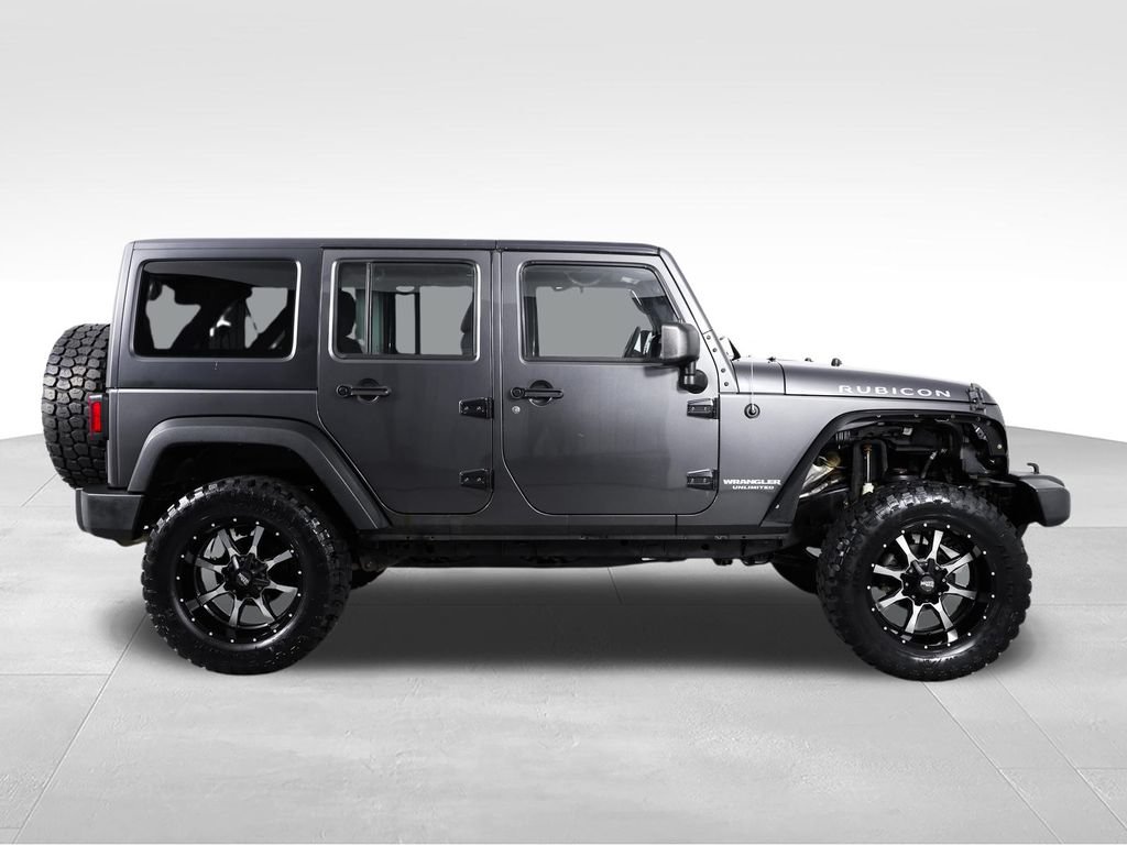 Used 2014 Jeep Wrangler Unlimited Rubicon w/ Dual Top Group AWD/4WD image 10