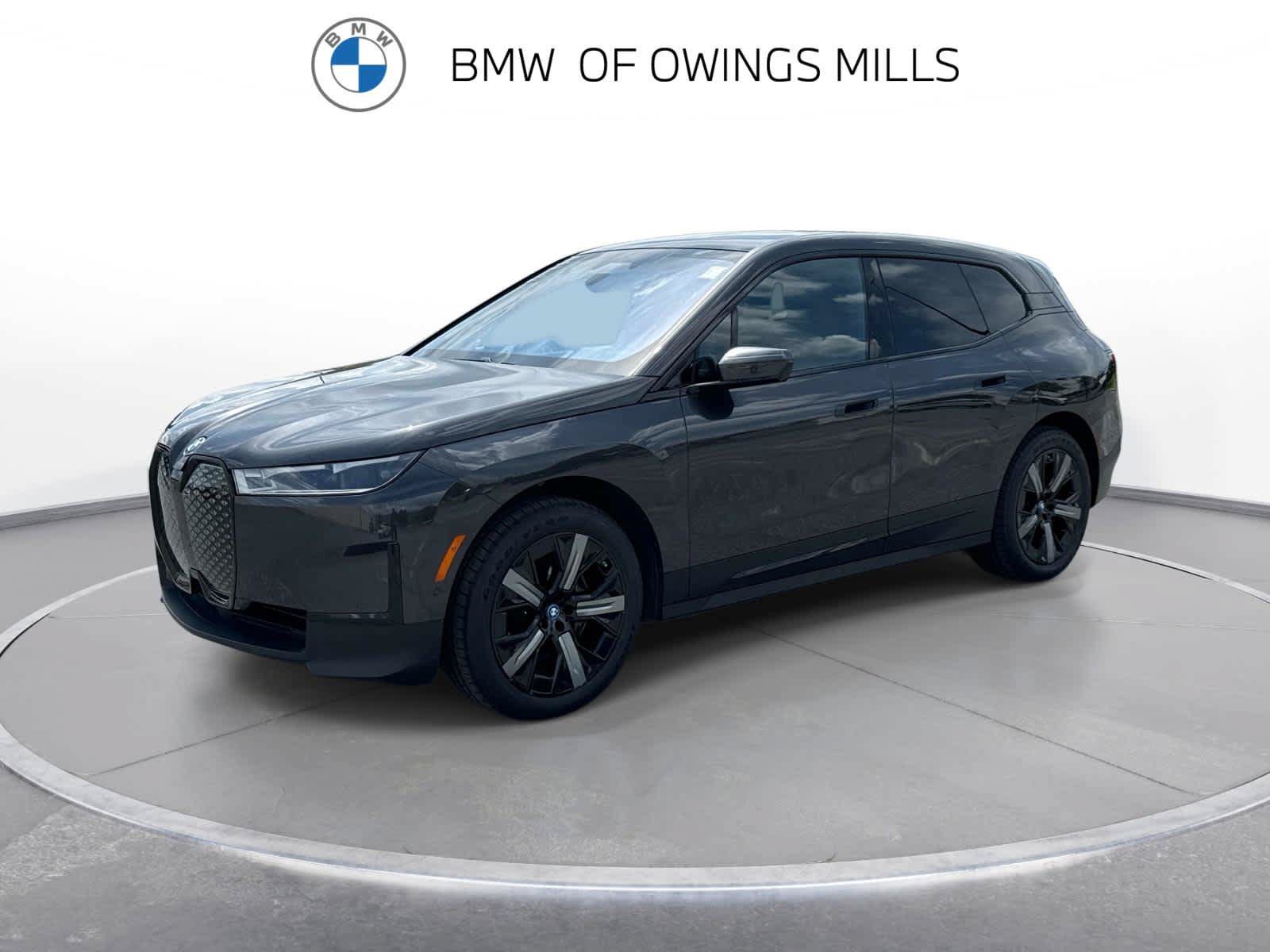 Used 2024 BMW iX xDrive50 w/ Premium Package AWD/4WD image 1