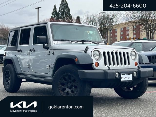 Used 2011 Jeep Wrangler Unlimited Sport image 1