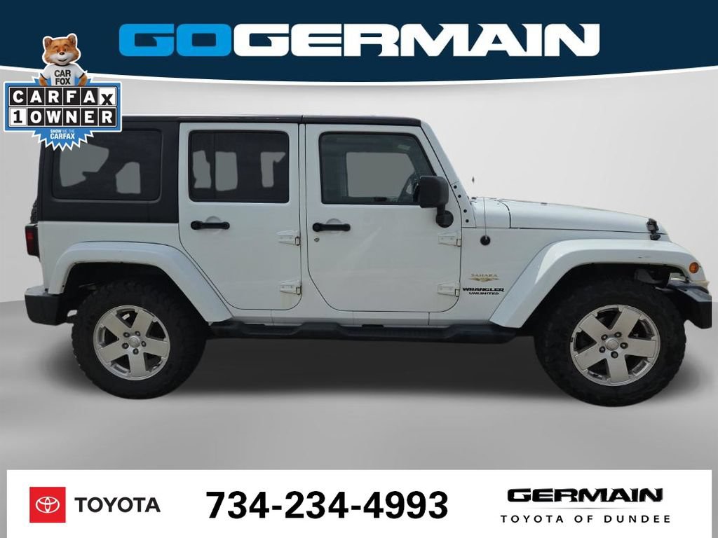 Used 2012 Jeep Wrangler Unlimited Sahara w/ Dual Top Group AWD/4WD image 6