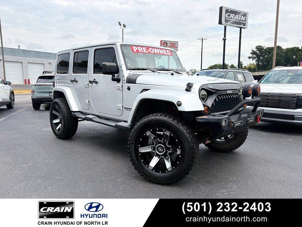 Used 2012 Jeep Wrangler Unlimited Sahara AWD/4WD image 1