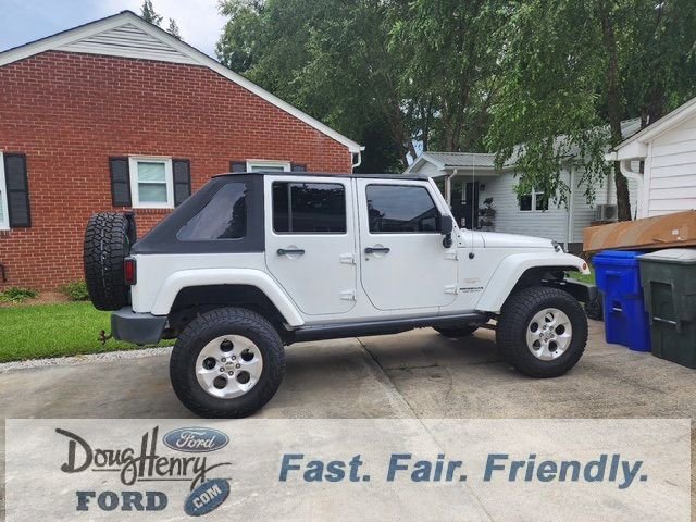 Used 2014 Jeep Wrangler Unlimited Sahara w/ Dual Top Group image 50
