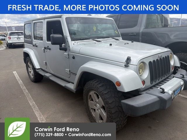 Used 2011 Jeep Wrangler Unlimited Sahara w/ Trailer Tow Group AWD/4WD image 1