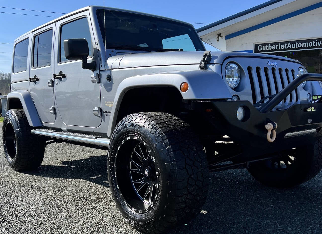 Used 2015 Jeep Wrangler Unlimited Sahara w/ Dual Top Group image 1
