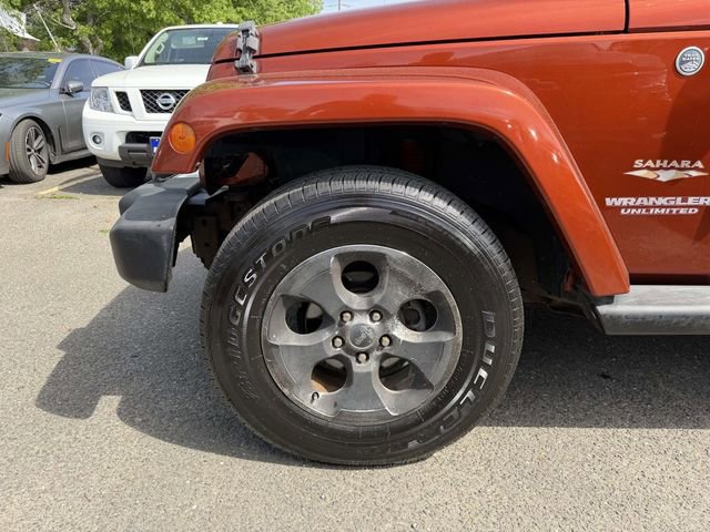 Used 2014 Jeep Wrangler Unlimited Sahara w/ Dual Top Group AWD/4WD image 5
