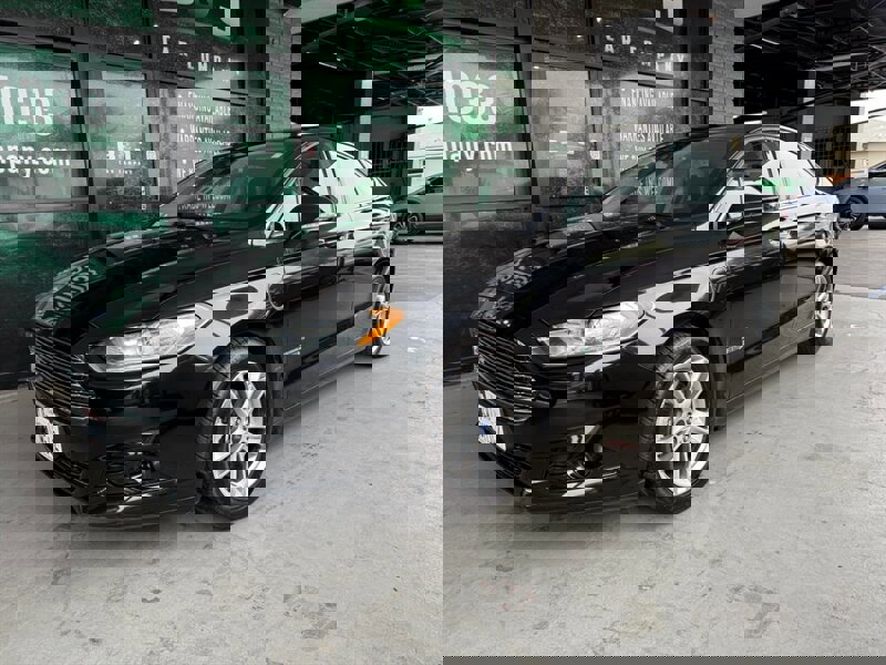 Used 2015 Ford Fusion Energi Titanium image 1